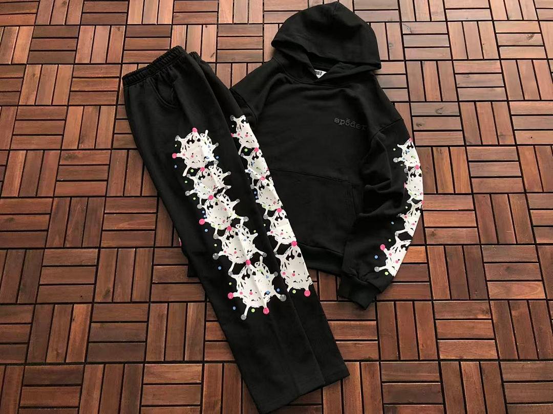 Sp5der tracksuit set model graphic close-up