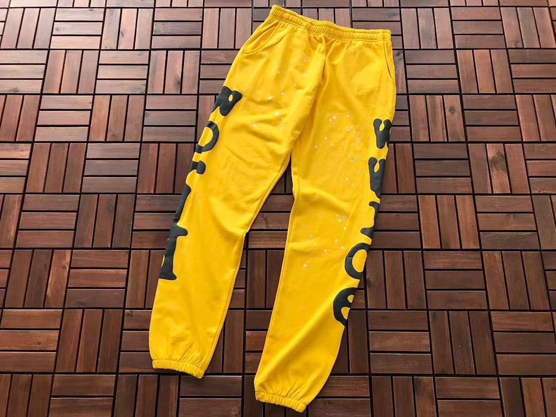 Sp5der tracksuit set model graphic close-up