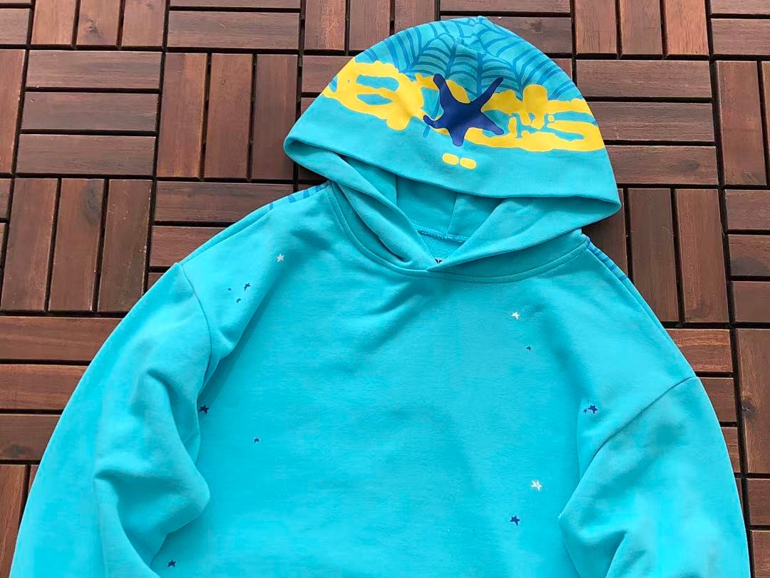 Sp5der tracksuit set model graphic close-up